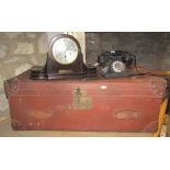 A vintage heavy gauge stitched brown leather suitcase with brass fittings, together with an early