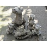 Five contemporary cast composition stone garden ornaments in the form of dragons in varying pose