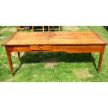 A 19th century French provincial cherrywood farmhouse kitchen table, the rectangular planked top