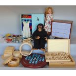 A collection of vintage toy items to include dolls, dolls house furniture, a solitaire marble