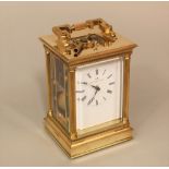 Good quality gilt brass repeater carriage clock by Matthew Norman of London, the architectural