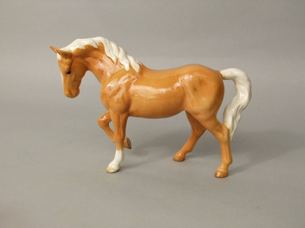 A Beswick group of a male and a foal raised on a moulded simulated grass base, together with two - Image 3 of 4