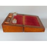 Late 19th century burr walnut writing slope, the hinged lid enclosing a baise fitted slope and two