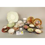 A collection of decorative tea and coffee wares including a set of six Royal Worcester Bacchanal