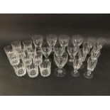 A good quality set of eight Waterford crystal faceted glasses, together with a further set of eleven