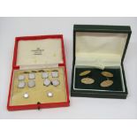 Cased 9ct white gold and mother of pearl dress set by George Tarratt comprising a pair of cufflinks,