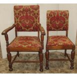 A set of five (4&1) oak framed dining chairs on turned supports with upholstered seats and backs