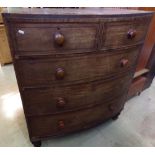 A 19th century mahogany bow fronted chest of three long and two short drawers with crossbanded