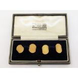 Pair of 18ct engine turned cufflinks, contained in a Goldsmiths & Silversmiths Company Ltd case