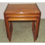 A nest of three G plan quadrille teak occasional tables