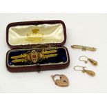 Mixed group of Victorian 9ct items comprising a ruby and diamond sweetheart brooch contained in a