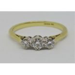 18ct three stone diamond ring, centre stone 0.20cts approx, size S, 3.5g