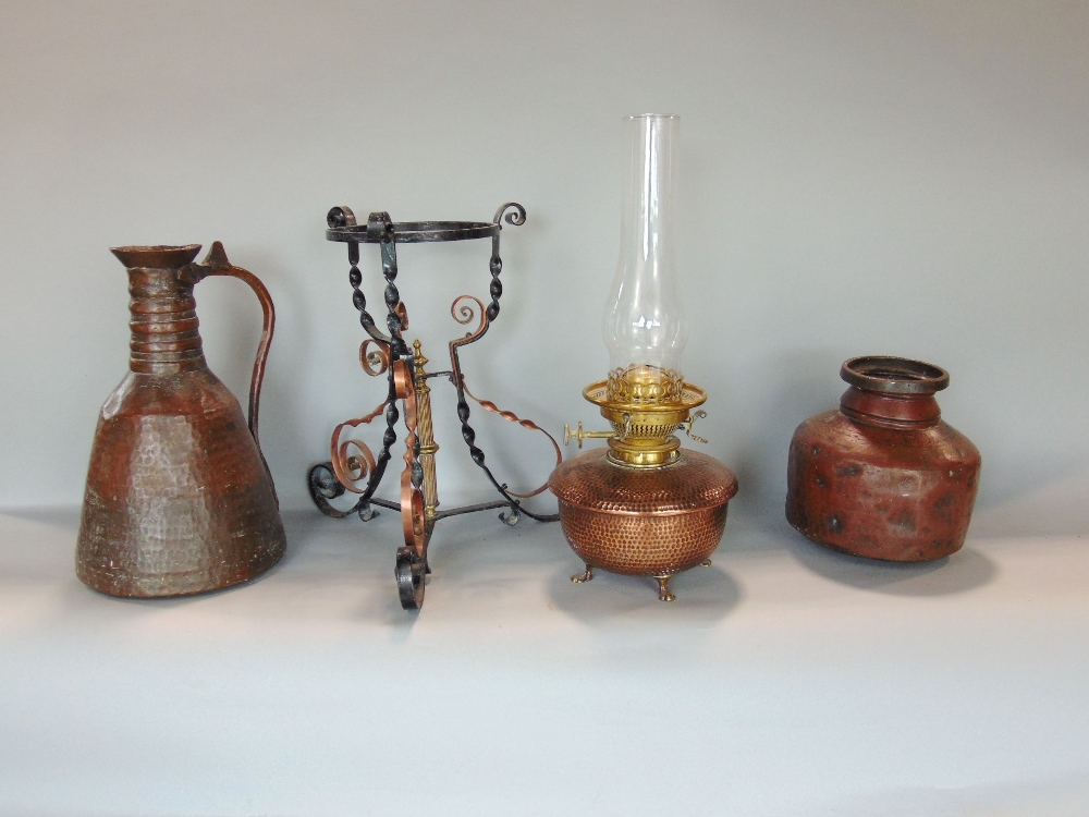 Benham & Froud planished copper oil lamp upon a barley twist wrought iron and copper tripod stand, - Image 2 of 3