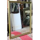 A pair of good quality contemporary gilt framed wall mirrors of rectangular form, with bevelled edge