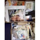Three boxes containing a large quantity of stamps in albums, on stockcards, FDC's, Stamp