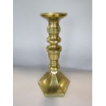 Large brass candlestick inscribed Bedford Burial Society founded AD 1859, J Smythe maker, 29 cm