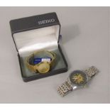 Cased gold plated Seiko gents quartz wristwatch with date aperture, with box and booklet, together