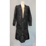 1920's/30's dress in black silk with jacquard weave; jacket style front has enclosed front panel