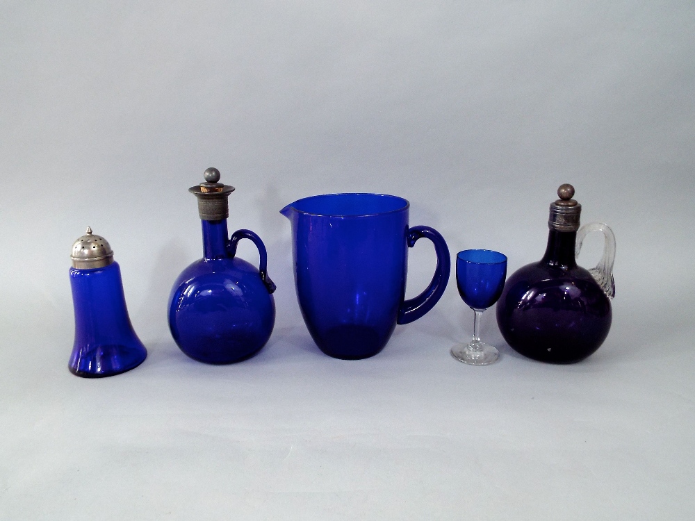 Two similar blue and amethyst glass wine flasks with white metal collars and stoppers together - Image 2 of 2