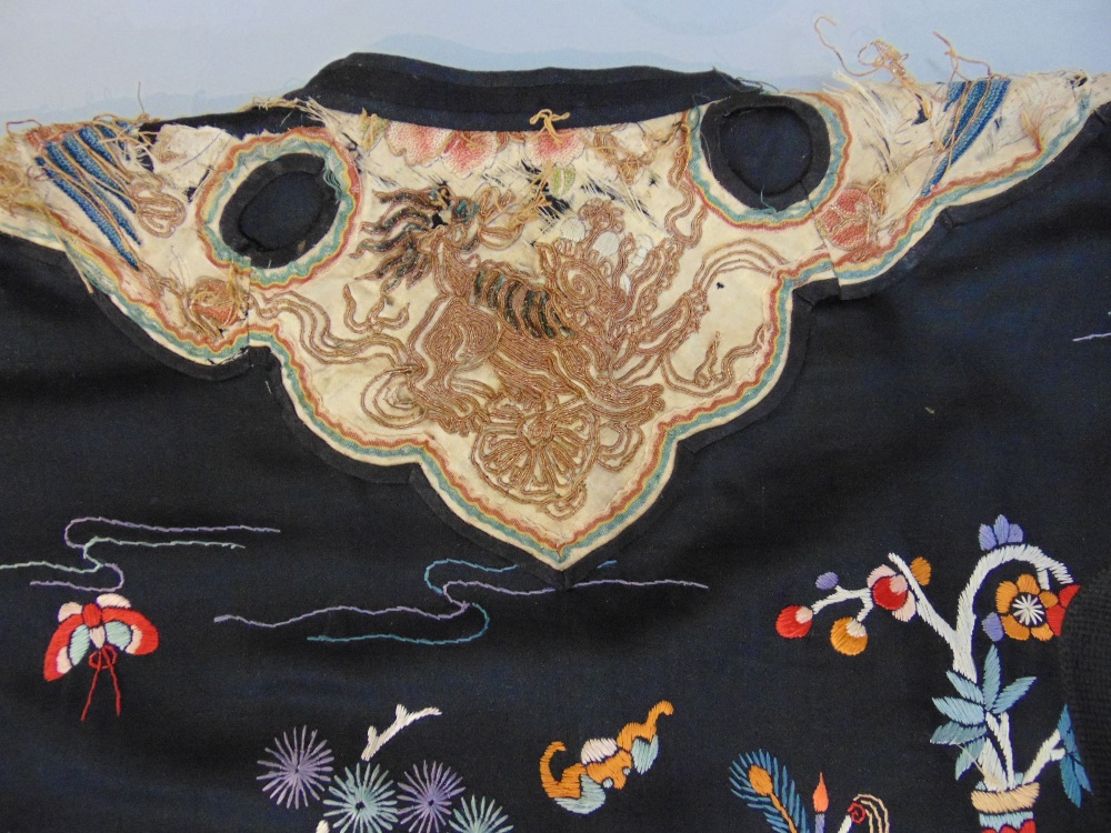 Late 19th/ early 20th century Chinese robe with black silk ground extensively embroidered with - Image 9 of 9