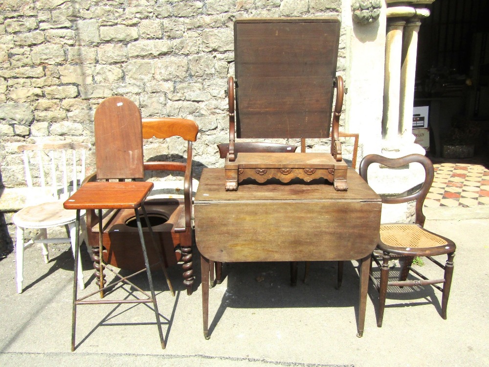 A rustic hardwood floorstanding open bookcase with loose shelves, a Georgian mahogany Pembroke