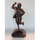 Novelty cold cast resin figure of Eric Morecambe by Graham Ibbeson, (signature), 35 cm high (boxed)