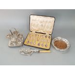 A mixed collection of plated items to include silver plate and ivory handled asparagus server,