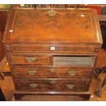 A small 18th century walnut and figured walnut ladies writing bureau of two long and two short