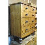 A Victorian stripped pine bedroom chest of two short over three long graduated drawers, with