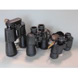 Three pairs of binoculars to include 12x60 Greenkat, Bell & Howell 8x40 and Celestron Skymaster 8x56