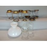 A collection of various lighting to include glass dome shaped shade, two glass candle shades and