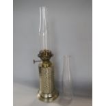 Small single planished chrome oil burner with two chimneys
