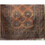 Good quality Persian carpet with geometric central floral medallion upon an orange ground, 250 x 160