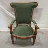 Oak framed open armchair with upholstered sprung seat, padded back and arms within a sheet and