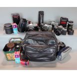 A box of various camera equipment to include various cameras including a Petrittl, Praktica MTL3,