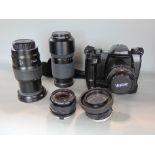 Minolta Dynax 600 SI Classic Camera, together with a collection of lenses to include Minolta AF35-