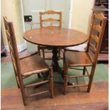 A set of three Georgian ashwood ladderback cottage dining chairs with solid seats, together with a