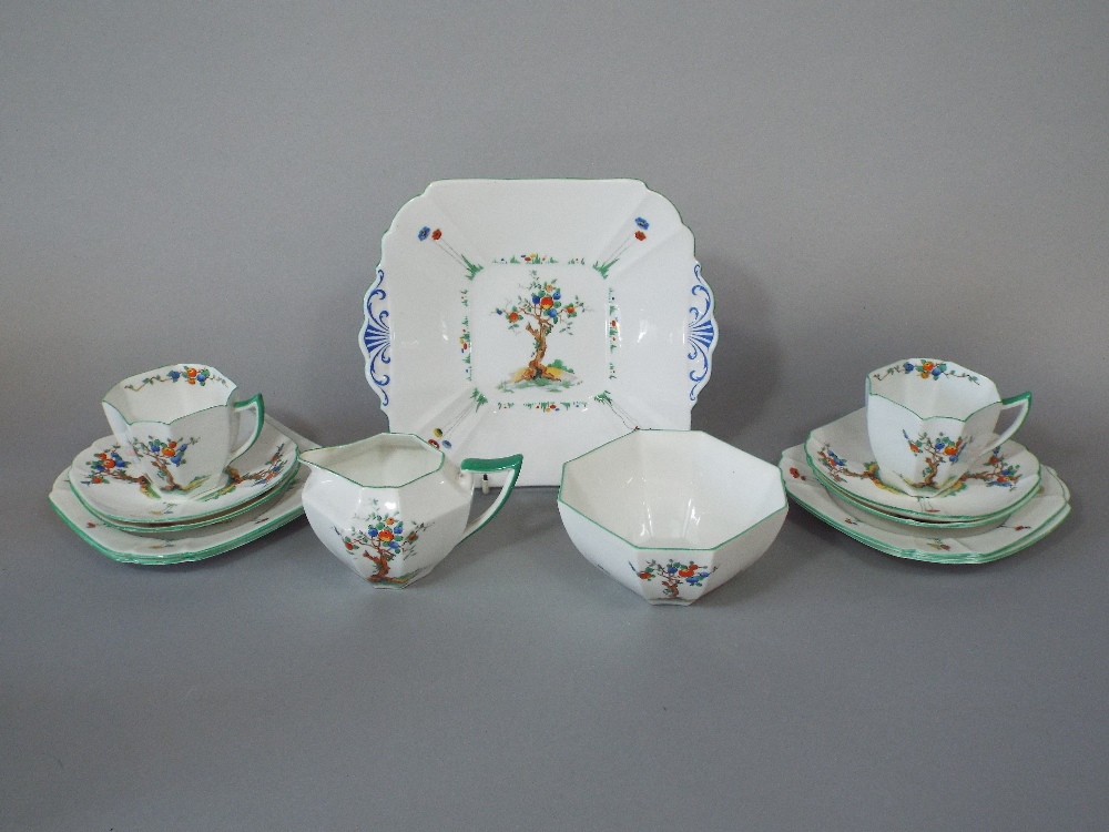 A collection of Shelley Art Deco tea wares, with fruiting tree decoration, comprising a pair of cake - Image 2 of 2