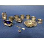 Mixed collection of silver to include six various napkin rings, pair of lidded mustards with blue