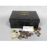 A tin strong box containing a collection of various 19th century and later coinage to include silver