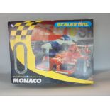 Scalextric Monaco boxed racing game with various parts and accessories
