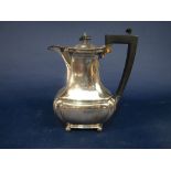 Early 20th century silver boat shaped faceted baluster coffee pot, maker marks worn, Birmingham