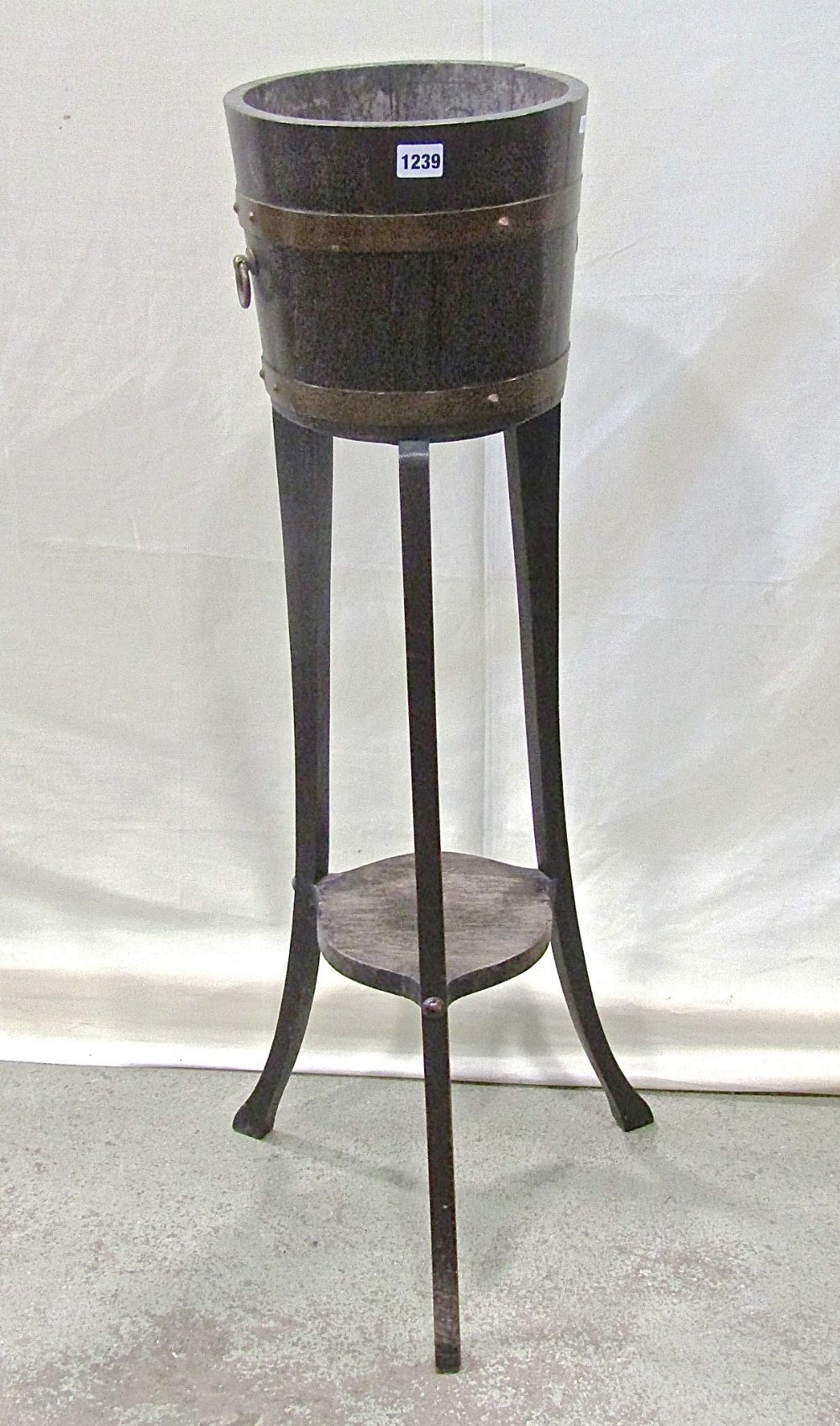 A Lister coopered oak jardiniere and stand, with swept supports