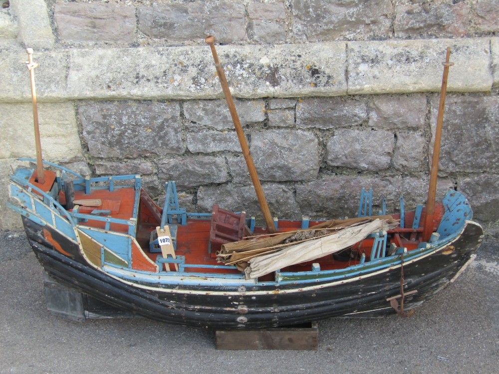 A well detailed scratch built model of a junk, with painted finish, complete with three masts and