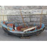A well detailed scratch built model of a junk, with painted finish, complete with three masts and