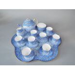 A collection of 19th century Worcester blue and white printed cabaret teawares with printed flower