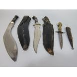 Interesting eastern dagger and sheath with pique work handle, with a Kukri and sheath and further