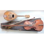 An unusual cased single stringed long neck violin with paper label to interior Italian renascent F H