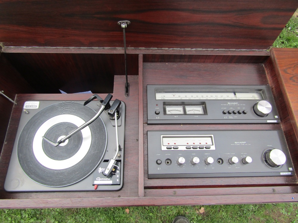 A Dynatron radiogram freestanding with hinged lid enclosing a Garrard 3000 turntable and sharp - Image 4 of 4