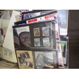 Two boxes and a crate containing a large quantity of GB and world stamps on stock cards, in bags,